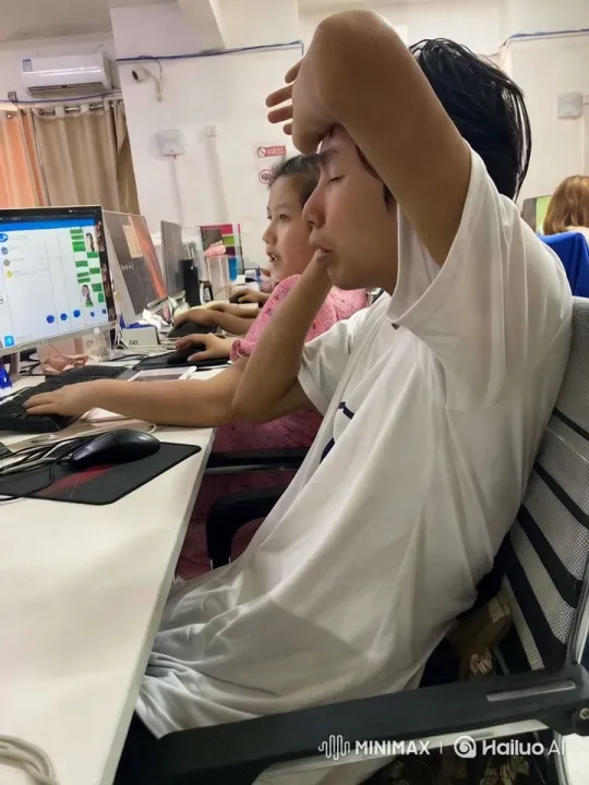 Man Crying at Desk Showcases Emotional Distress – AI Generated Video | Hailuo AI
