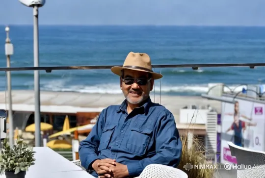 Man Stands Up on Ocean Terrace Amid Serene Setting – AI Generated Video | Hailuo AI