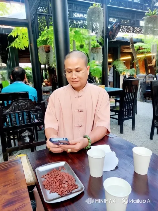 Tranquil Outdoor Scene with Person Using Smartphone – AI Generated Video | Hailuo AI