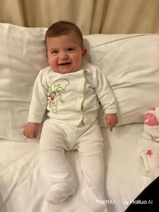 Baby's First Steps in Serene White Surroundings – AI Generated Video | Hailuo AI