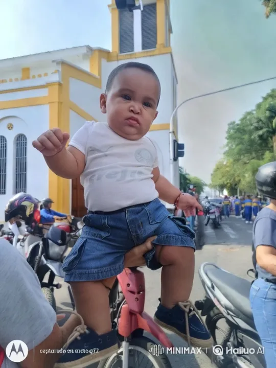 Child Dancing on Bicycle in Lively Street Scene – AI Generated Video | Hailuo AI