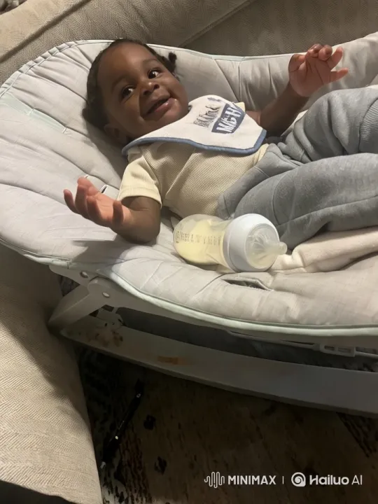 Baby's Joyful Play in Cozy Rocker Setting – AI Generated Video | Hailuo AI