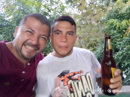 Men Share Affectionate Moment in Lush Greenery – AI Generated Video | Hailuo AI