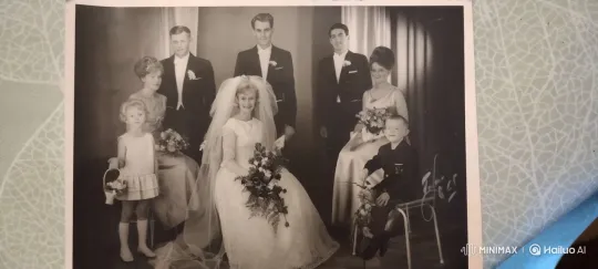 Vintage Wedding Photo: Family's Synchronized Waves – AI Generated Video | Hailuo AI