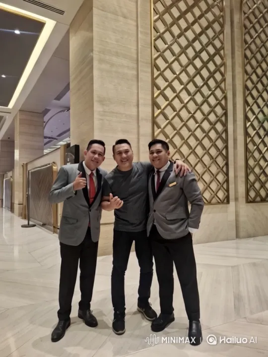Formal Men in Elegant Lobby with Dynamic Camera Work – AI Generated Video | Hailuo AI