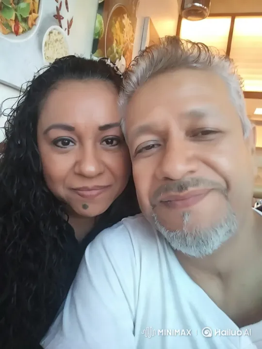 Romantic Couple's Tender Moment in a Cozy Restaurant – AI Generated Video | Hailuo AI