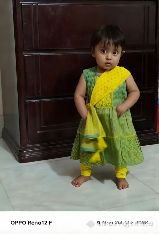 Vibrant Child in Traditional Outfit on Marble Floor – AI Generated Video | Hailuo AI