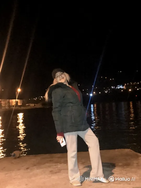 Night Waterfront Reflections with Relaxed Subject – AI Generated Video | Hailuo AI