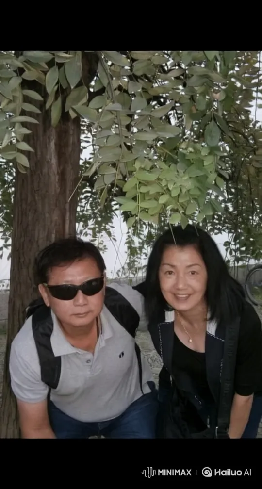Couple Embraces Under Lush Tree with Romantic Vibe – AI Generated Video | Hailuo AI