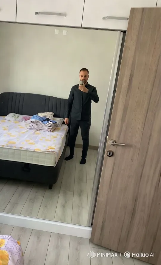 Young Man Dancing in Minimalist Bedroom – AI Generated Video | Hailuo AI