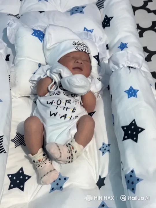 Baby's Playful Kung Fu Moves on Star-Themed Bedding – AI Generated Video | Hailuo AI