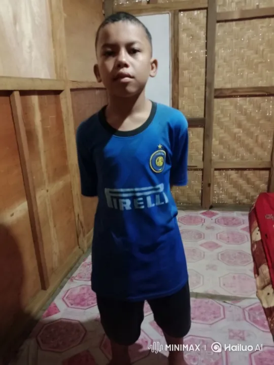 Young Boy in a Modest Wooden Room Examined – AI Generated Video | Hailuo AI