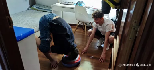 Boys Practicing Headstand in Cozy Bedroom – AI Generated Video | Hailuo AI