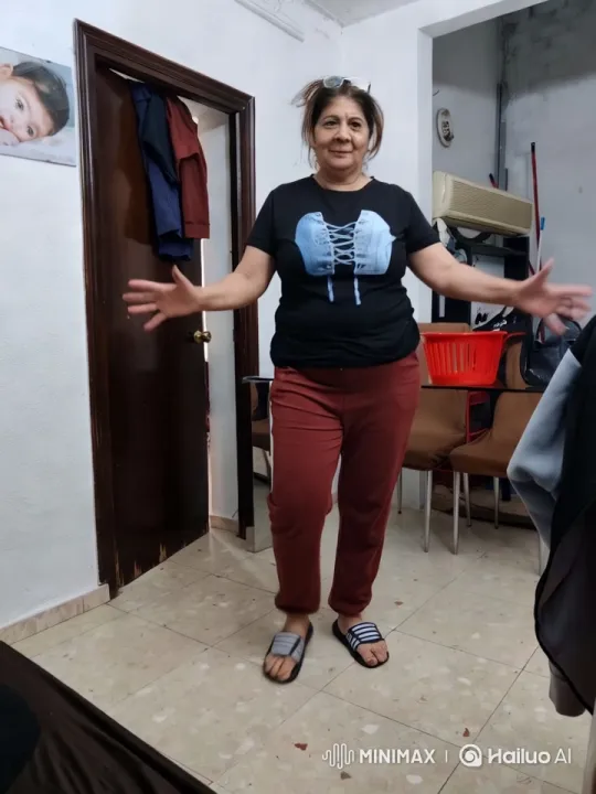 Woman Dances Energetically in Cluttered Room – AI Generated Video | Hailuo AI