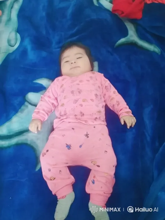 Baby Dancing Playfully on Dolphin-Print Blanket – AI Generated Video | Hailuo AI