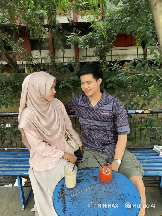 Couple Enjoying Drinks in a Serene Park Setting – AI Generated Video | Hailuo AI