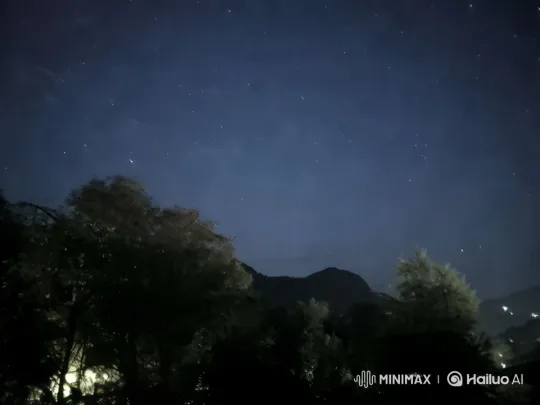 Tranquil Night Sky and Silhouetted Landscape – AI Generated Video | Hailuo AI