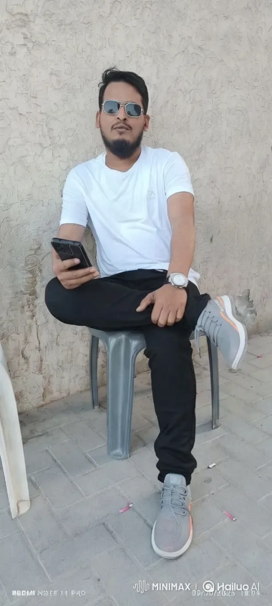 Young Man Wishes Eid Mubarak in Casual Outdoor Setting – AI Generated Video | Hailuo AI