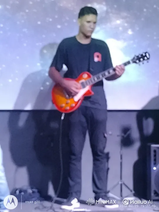 Young Guitarist Performs with Cosmic Ambiance – AI Generated Video | Hailuo AI