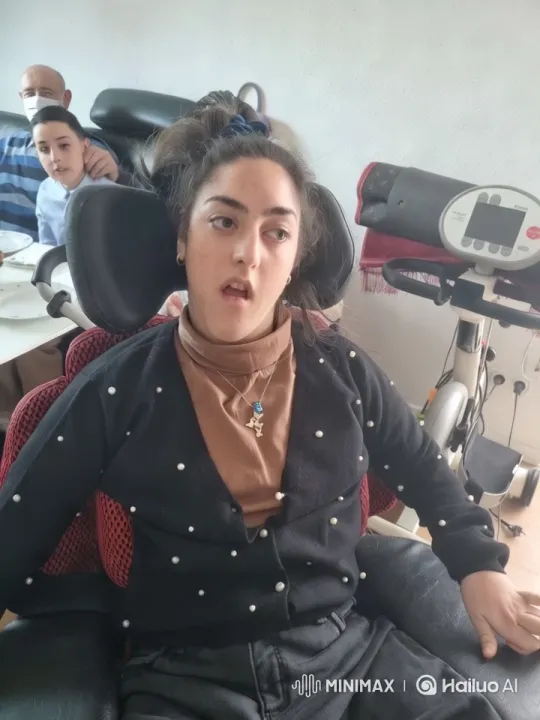 Young Woman in Wheelchair in Elegant Dining Setting – AI Generated Video | Hailuo AI