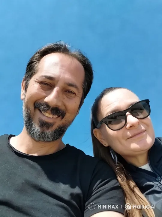 Couple's Intimate Kiss Against Blue Sky – AI Generated Video | Hailuo AI