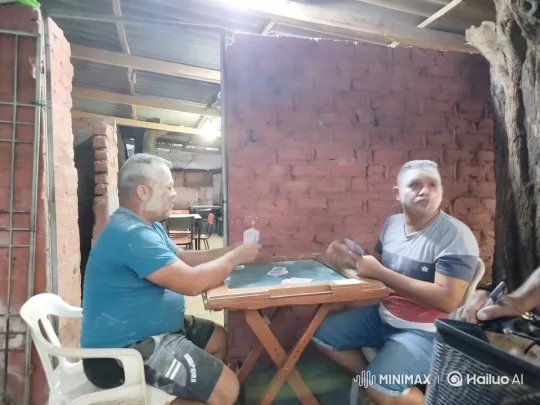 Men Dance Joyfully in Rustic Card Game Setting – AI Generated Video | Hailuo AI