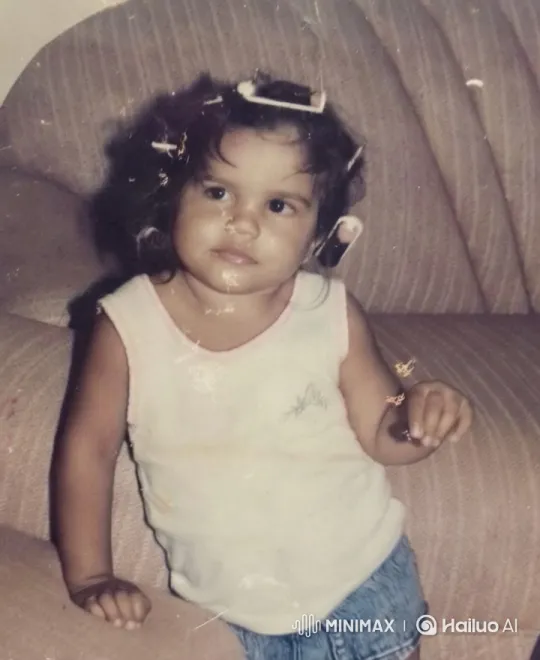 Child on Couch with Curlers in Intimate Setting – AI Generated Video | Hailuo AI