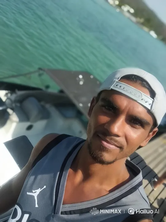 Tranquil Seaside Scene with Relaxed Man – AI Generated Video | Hailuo AI