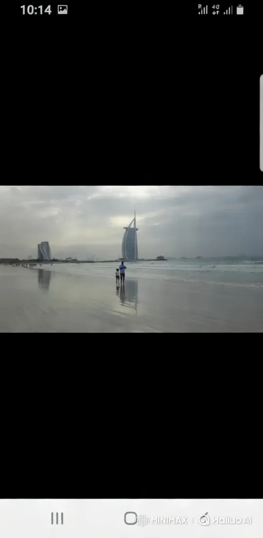 Serene Beach Walk with Burj Al Arab Reflection – AI Generated Video | Hailuo AI