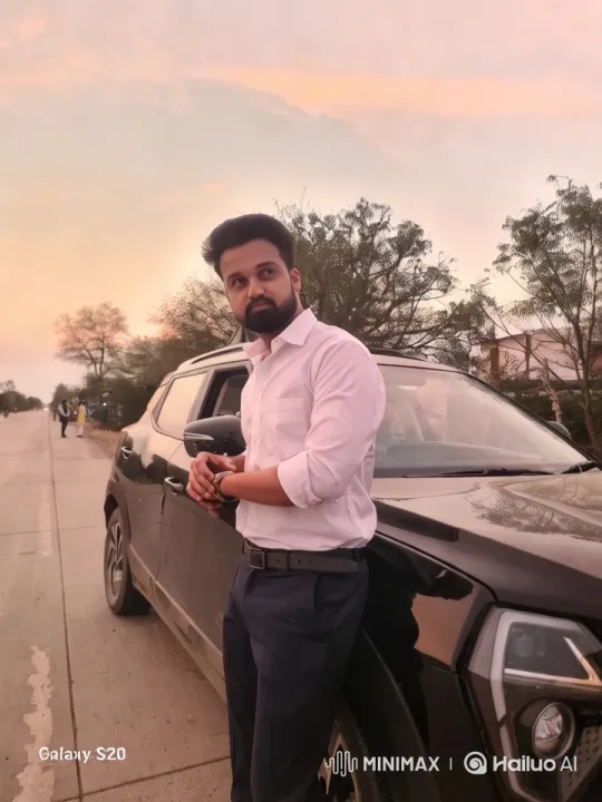Man Relaxing by Car Amidst Serene Sunset – AI Generated Video | Hailuo AI