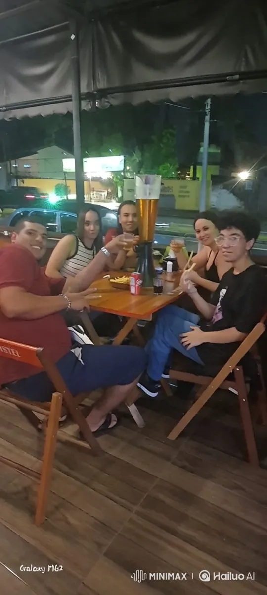 Outdoor Friendship Gathering with Beer Tower at Night – AI Generated Video | Hailuo AI