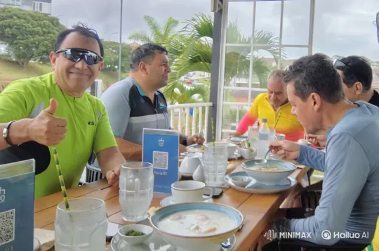 Friends Enjoying Outdoor Meal Amidst Nature's Beauty – AI Generated Video | Hailuo AI