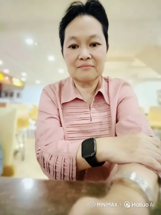 Relaxed Person at Café with Smartwatch – AI Generated Video | Hailuo AI
