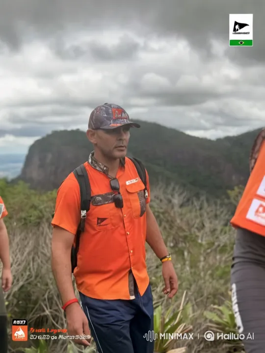 Hiker's Dynamic Ascent in Mountainous Landscape – AI Generated Video | Hailuo AI