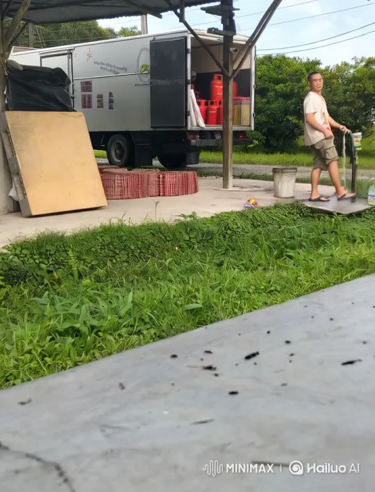Man Loads Gas Cylinders on Trolley in Pastoral Setting – AI Generated Video | Hailuo AI