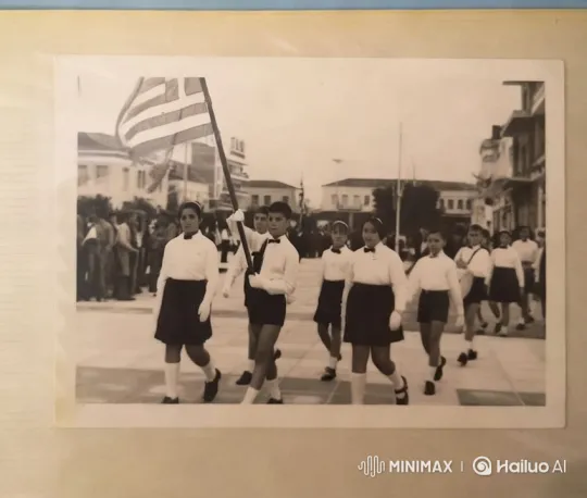 Historical Parade: Children March with Flag in Town Square – AI Generated Video | Hailuo AI
