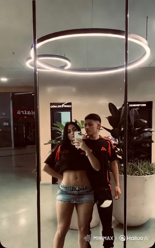 Couple Shares Intimate Moment in Modern, Stylish Setting – AI Generated Video | Hailuo AI