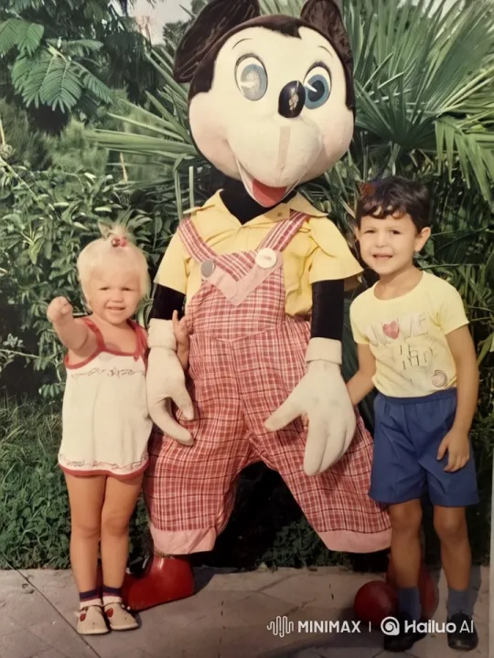 Joyful Children and Costumed Character in Garden Setting – AI Generated Video | Hailuo AI