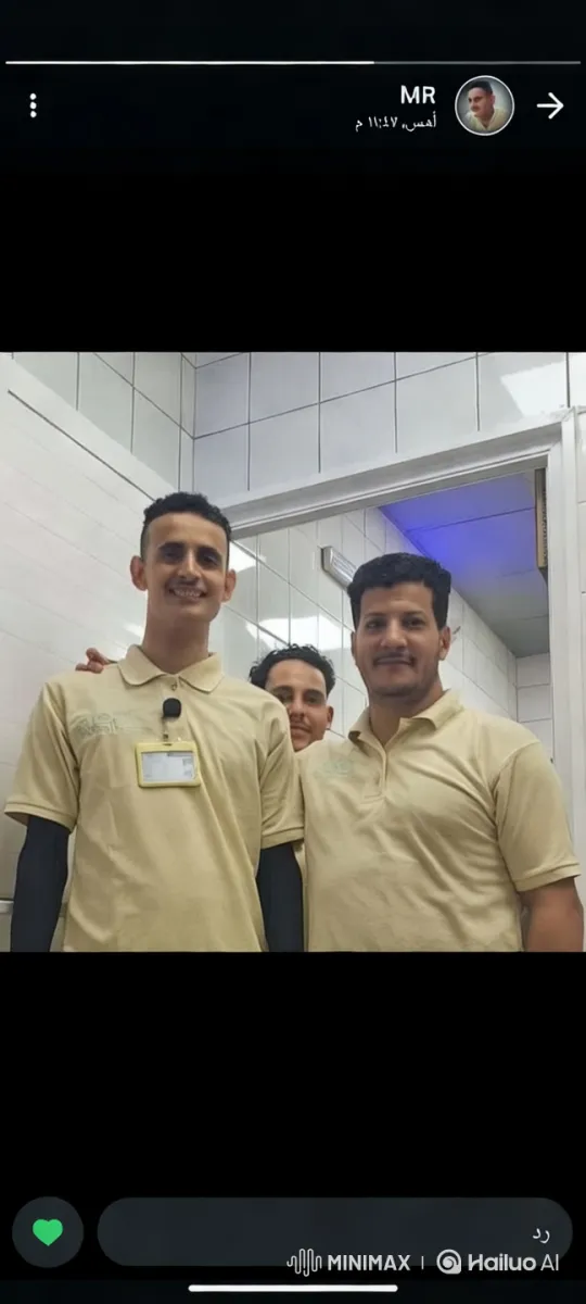 Three Individuals in a Bright, Tiled Staff Room – AI Generated Video | Hailuo AI