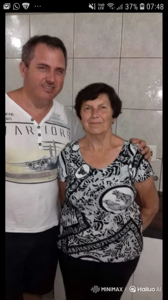 Warm Moment Shared by Middle-Aged Man and Elderly Woman – AI Generated Video | Hailuo AI