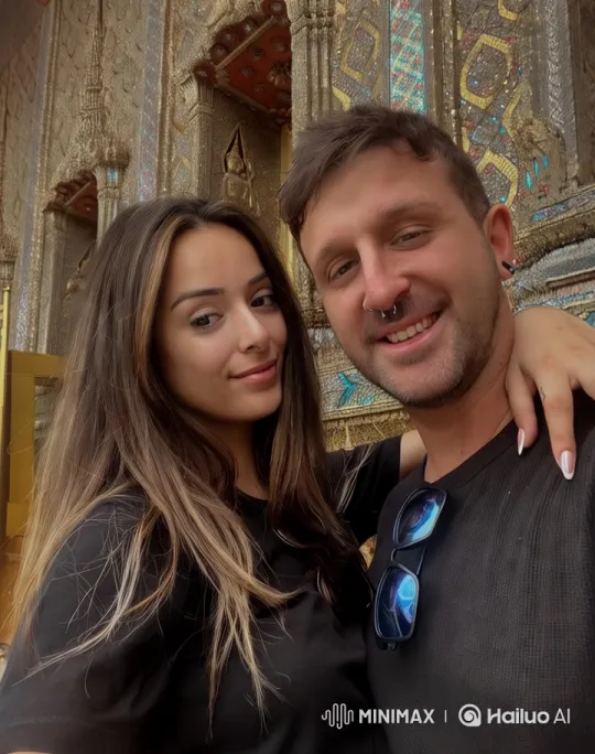 Couple in Front of Ornate Temple with Grand Architecture – AI Generated Video | Hailuo AI