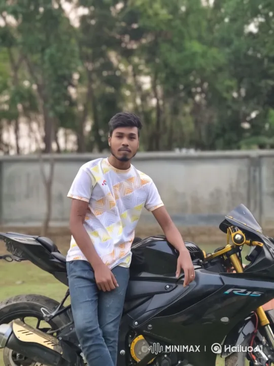 Young Man and Motorcycle: A Serene Outdoor Scene – AI Generated Video | Hailuo AI