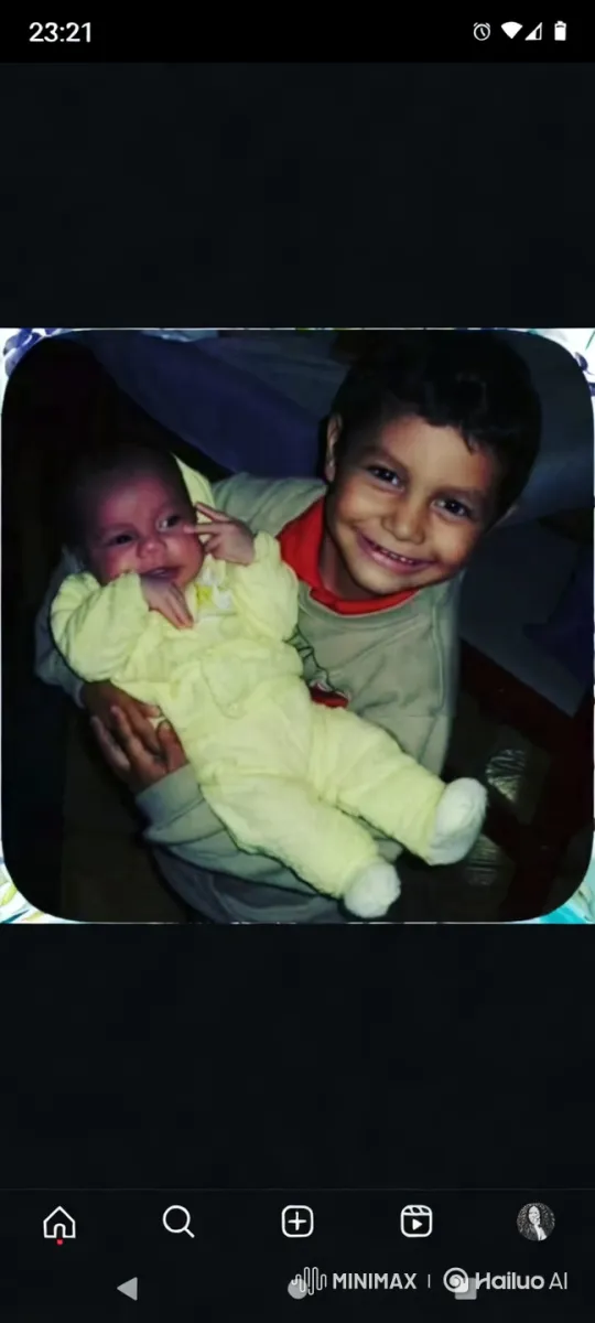Boy Cradles Baby in Intimate, Aesthetic Scene – AI Generated Video | Hailuo AI