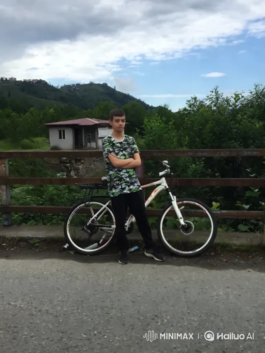 Child Rides White Bicycle Through Scenic Hills – AI Generated Video | Hailuo AI