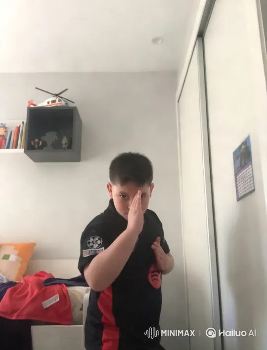 Boy in Fighting Stance in Colorful Bedroom – AI Generated Video | Hailuo AI