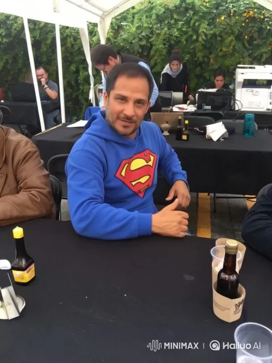 Relaxed Outdoor Dining Scene with Superman-Thumbs-Up – AI Generated Video | Hailuo AI