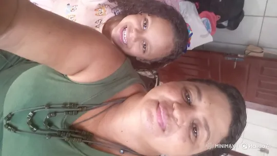 Intimate Portrait of Woman and Girl in Cozy Room – AI Generated Video | Hailuo AI