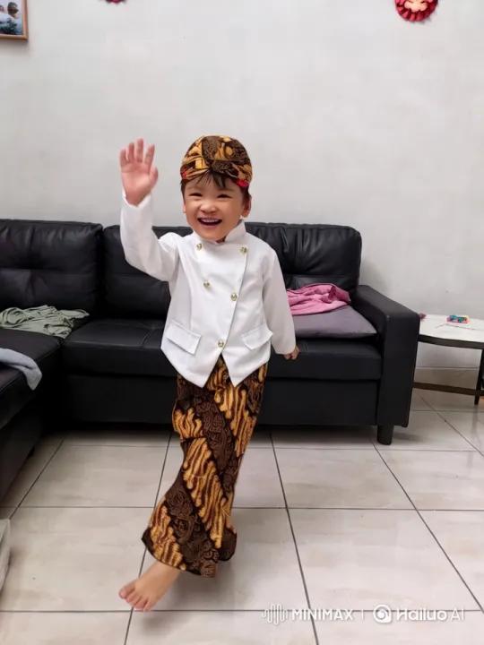 Child in Traditional Attire Showcases Cozy Living Room – AI Generated Video | Hailuo AI