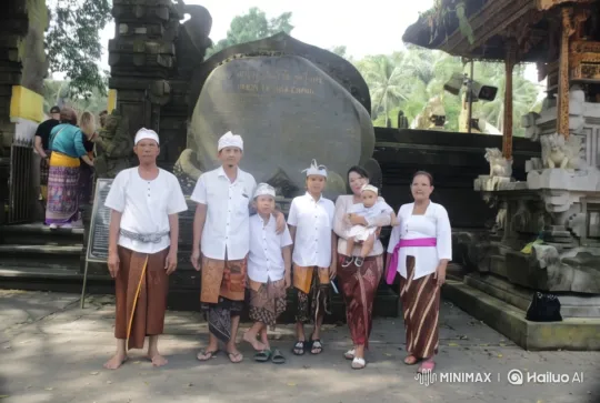 Balinese Group in Traditional Attire at Ancient Monument – AI Generated Video | Hailuo AI