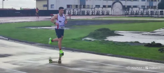 Athlete 681 Sprinting on Wet Track with Vibrant Shoes – AI Generated Video | Hailuo AI